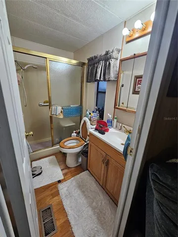 a view of lake with green space