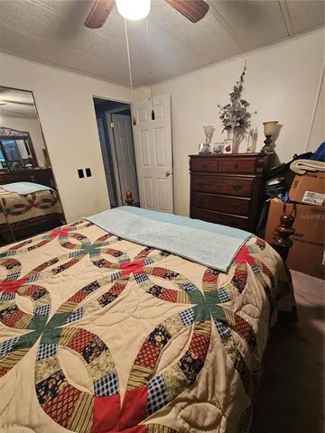 a view of a large yard with lots of green space