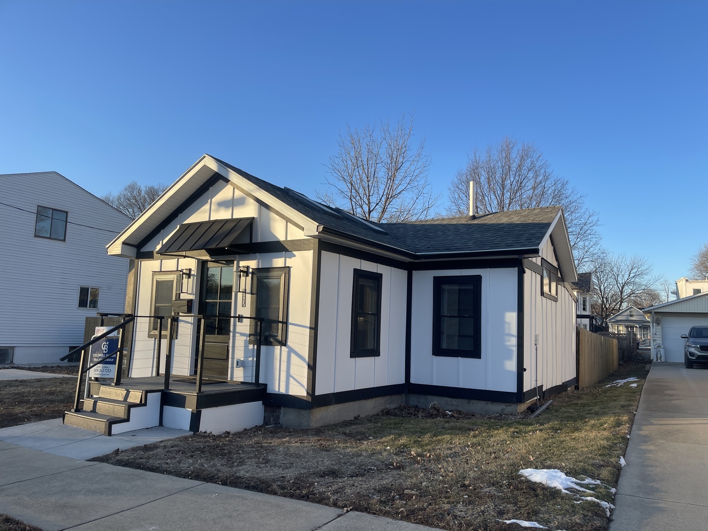 607 West Olive Street Bloomington, IL 61701 - Photo 1 of 17 a view of a small house in the backyard