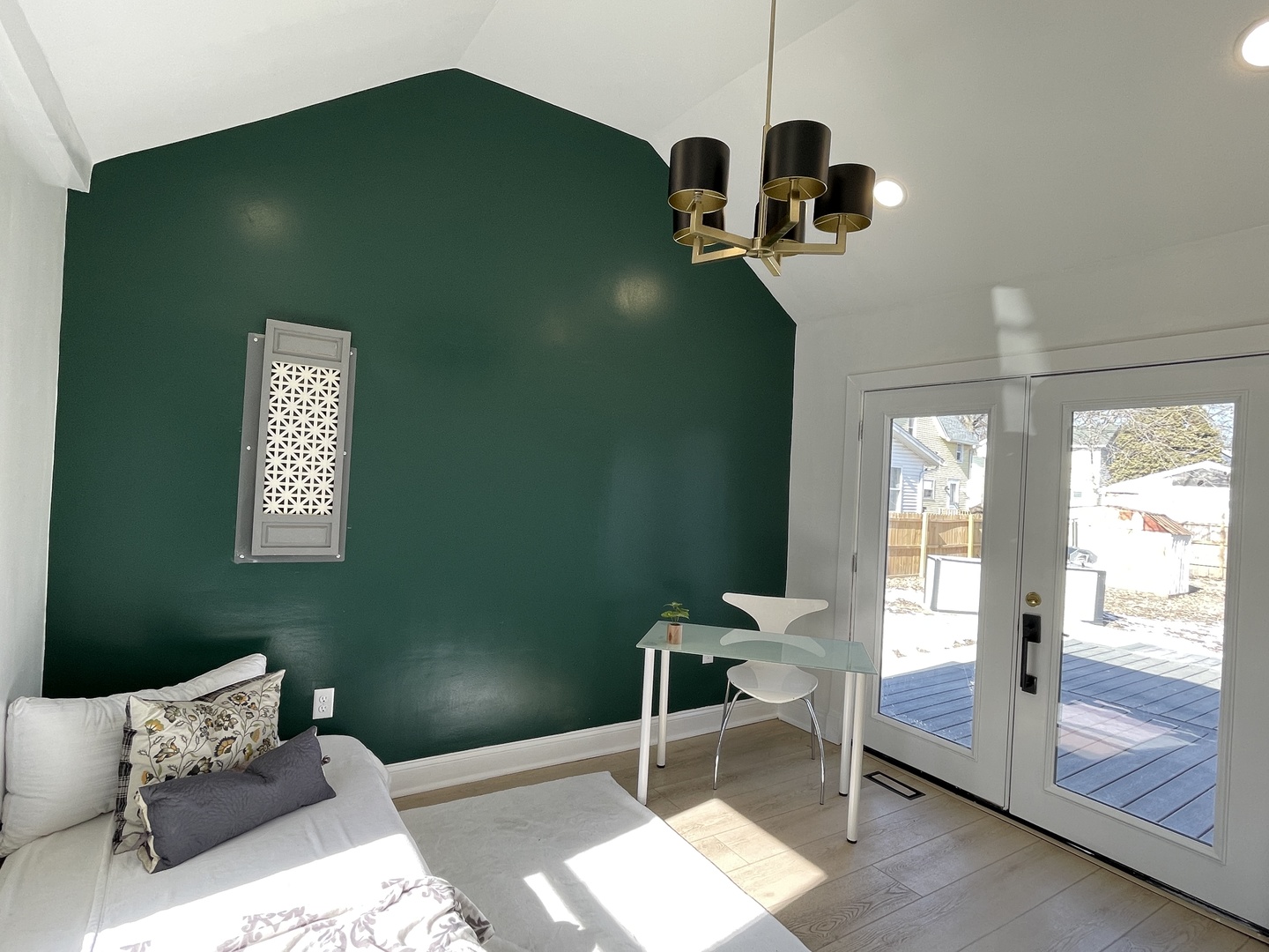 607 West Olive Street Bloomington, IL 61701 - Photo 12 of 21 a bedroom with a bed and windows