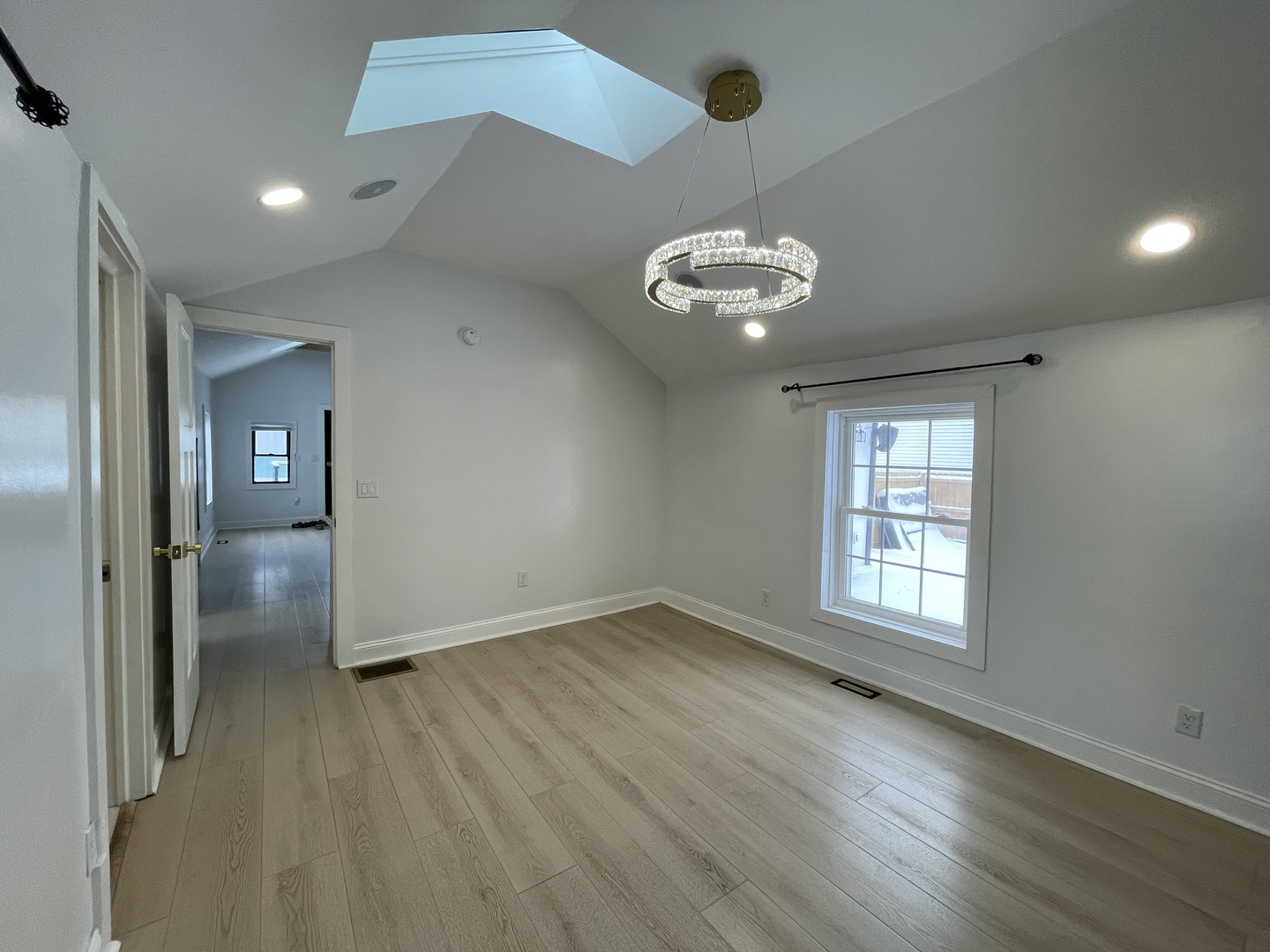 607 West Olive Street Bloomington, IL 61701 - Photo 10 of 17 wooden floor in an empty room with a window