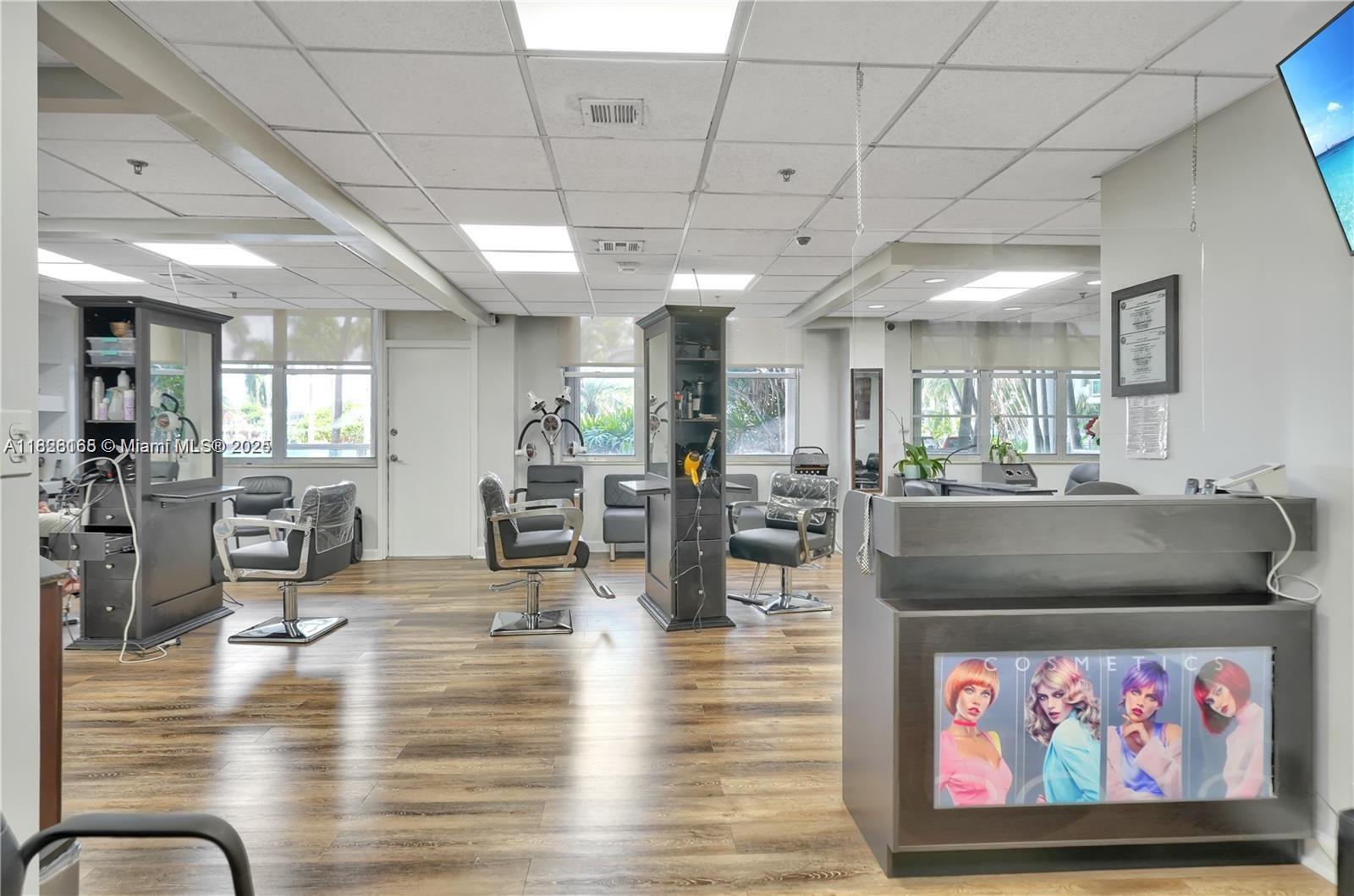 5151 Collins Avenue, Unit 535 Miami Beach, FL 33140 - Photo 29 of 34 a living room with fireplace furniture and wooden floor