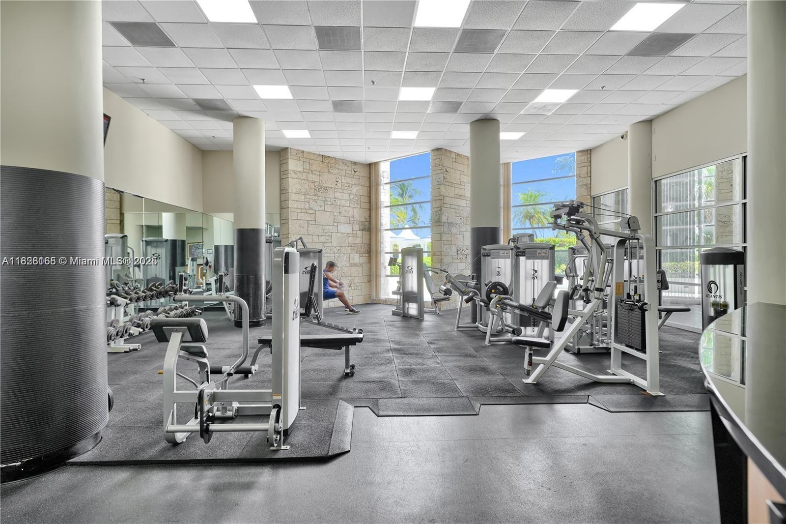 5151 Collins Avenue, Unit 535 Miami Beach, FL 33140 - Photo 34 of 34 a view of a room with gym equipment