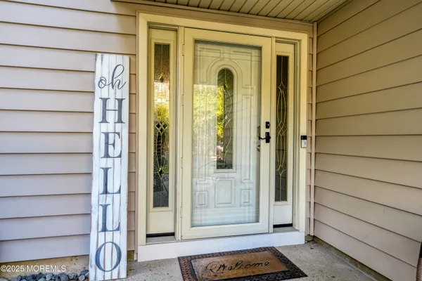 a aerial view of a house with a yard