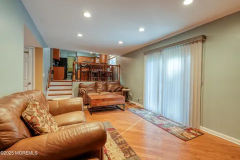 an aerial view of a house with yard swimming pool and outdoor seating