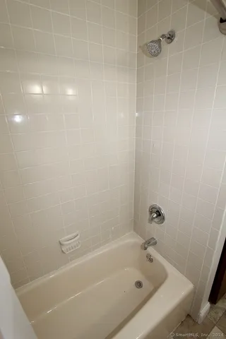 a bathroom with a bathtub