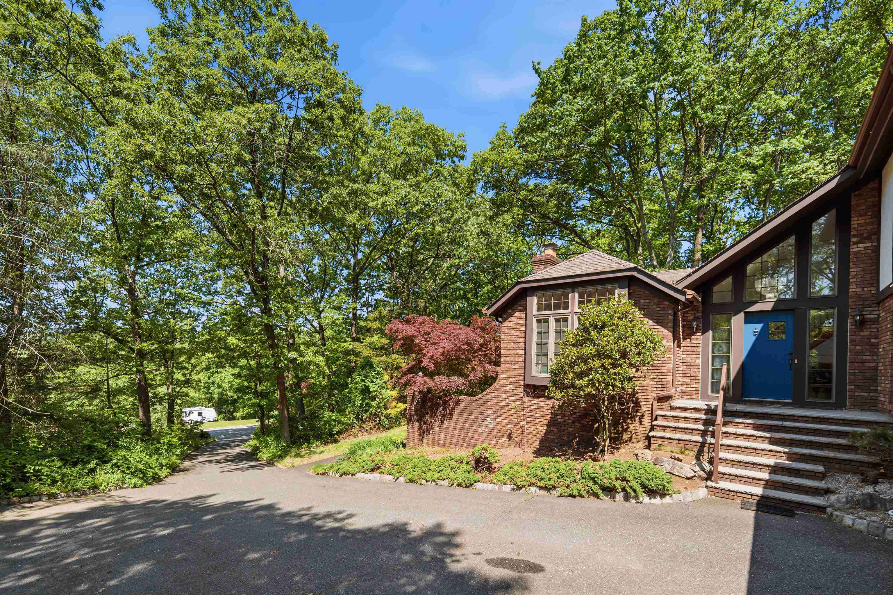 2 Carol Road Butler, NJ 07405 - Photo 45 of 49 a front view of a house with a yard