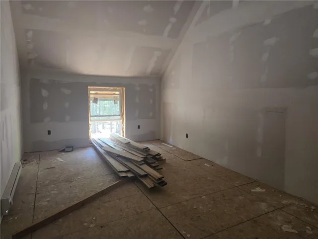 a view of a room with natural light