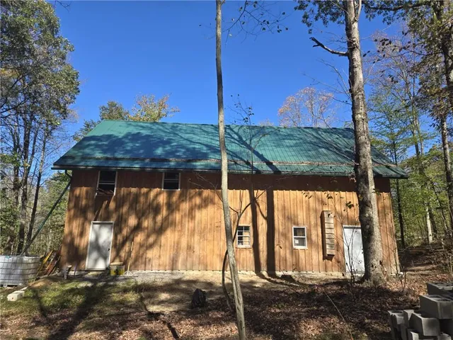 a kitchen with stove and cabinets