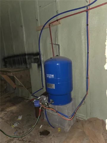 a bathroom with a toilet and shower