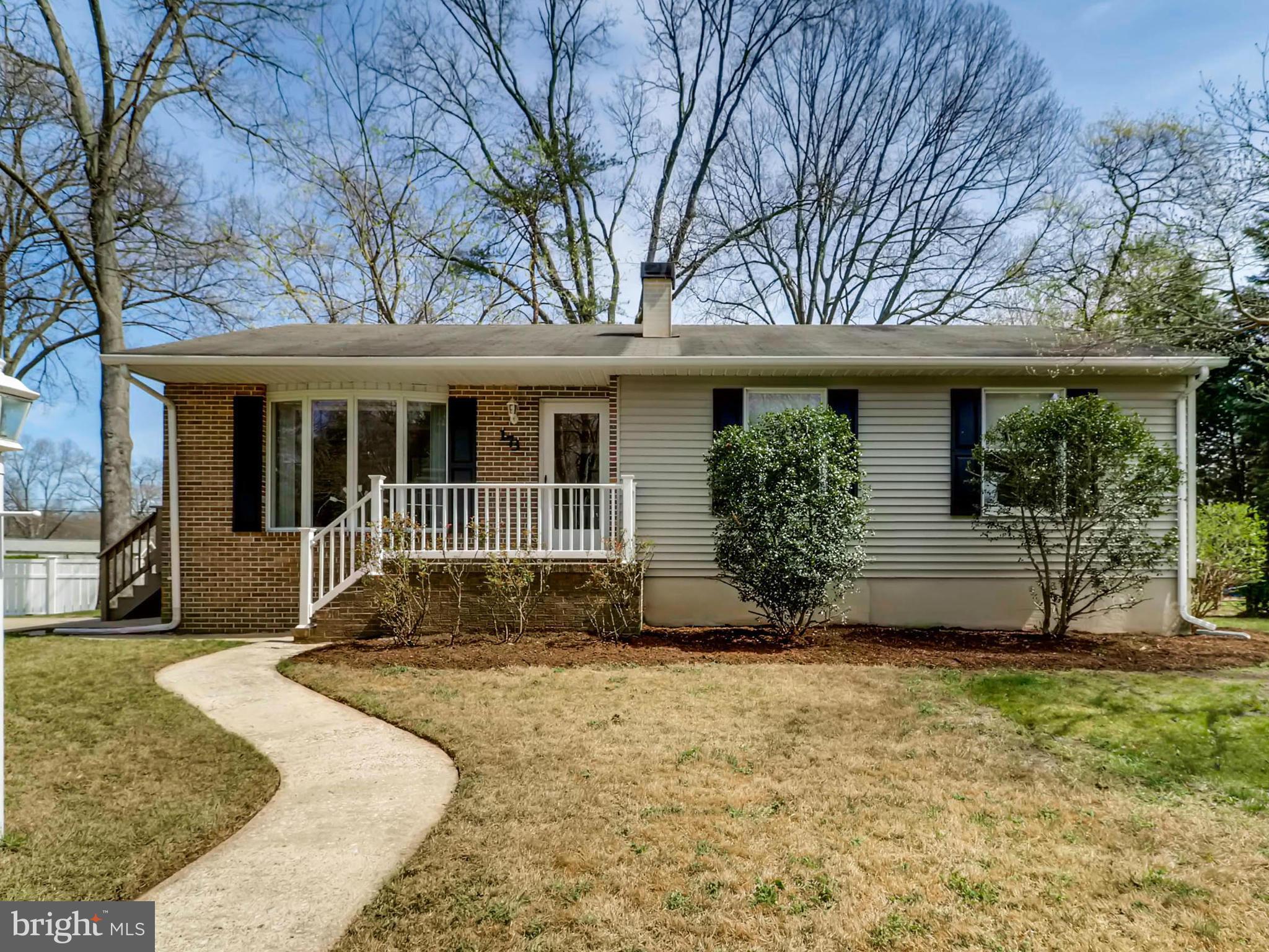 173 Copper Road Severna Park, MD 21146 - Photo 2 of 29 front view of a house with a yard