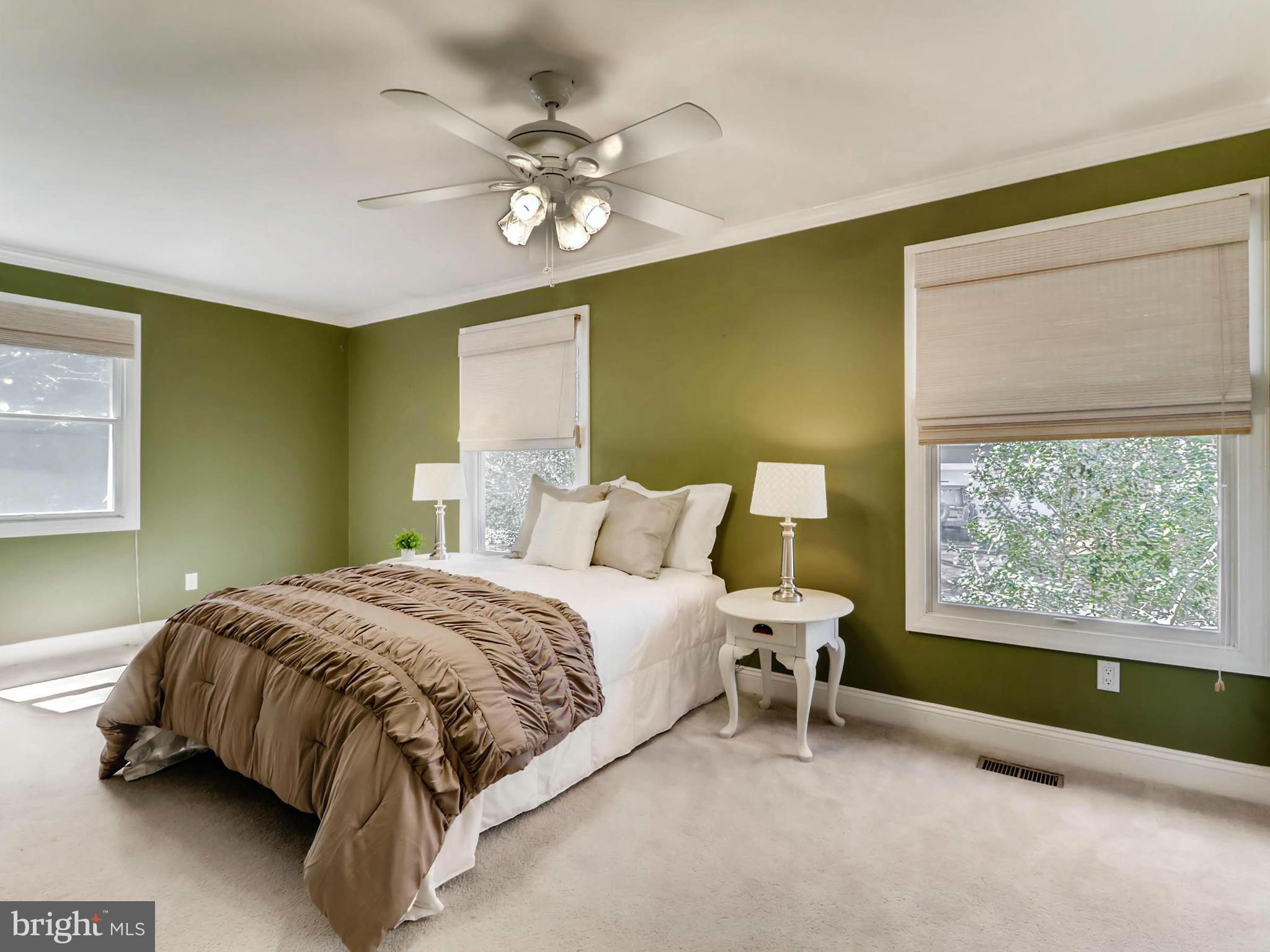 173 Copper Road Severna Park, MD 21146 - Photo 11 of 29 a bedroom with a bed dresser and a window
