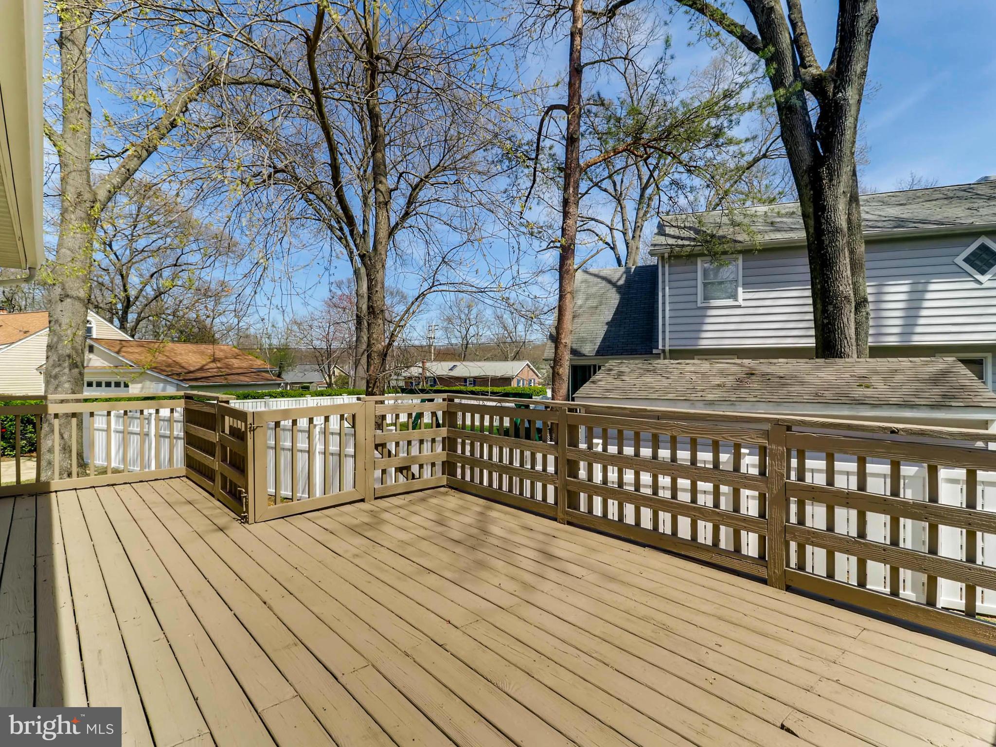 173 Copper Road Severna Park, MD 21146 - Photo 23 of 29 a view of a wooden deck with a trees