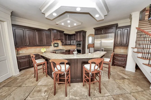 a view of dining room with furniture and entryway