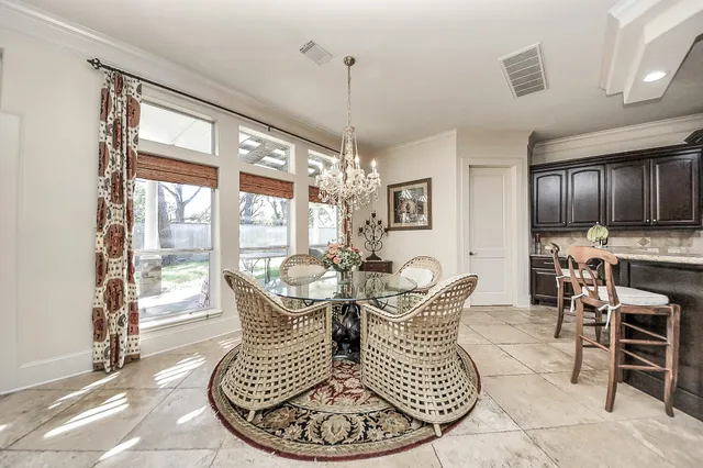 a bathroom with a toilet a sink and a mirror