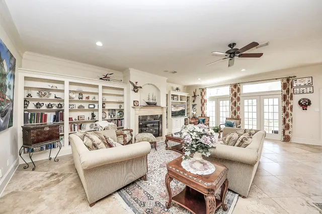 a living room with furniture and a rug