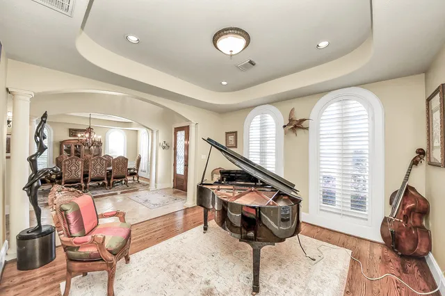 a kitchen with stainless steel appliances granite countertop a sink and cabinets