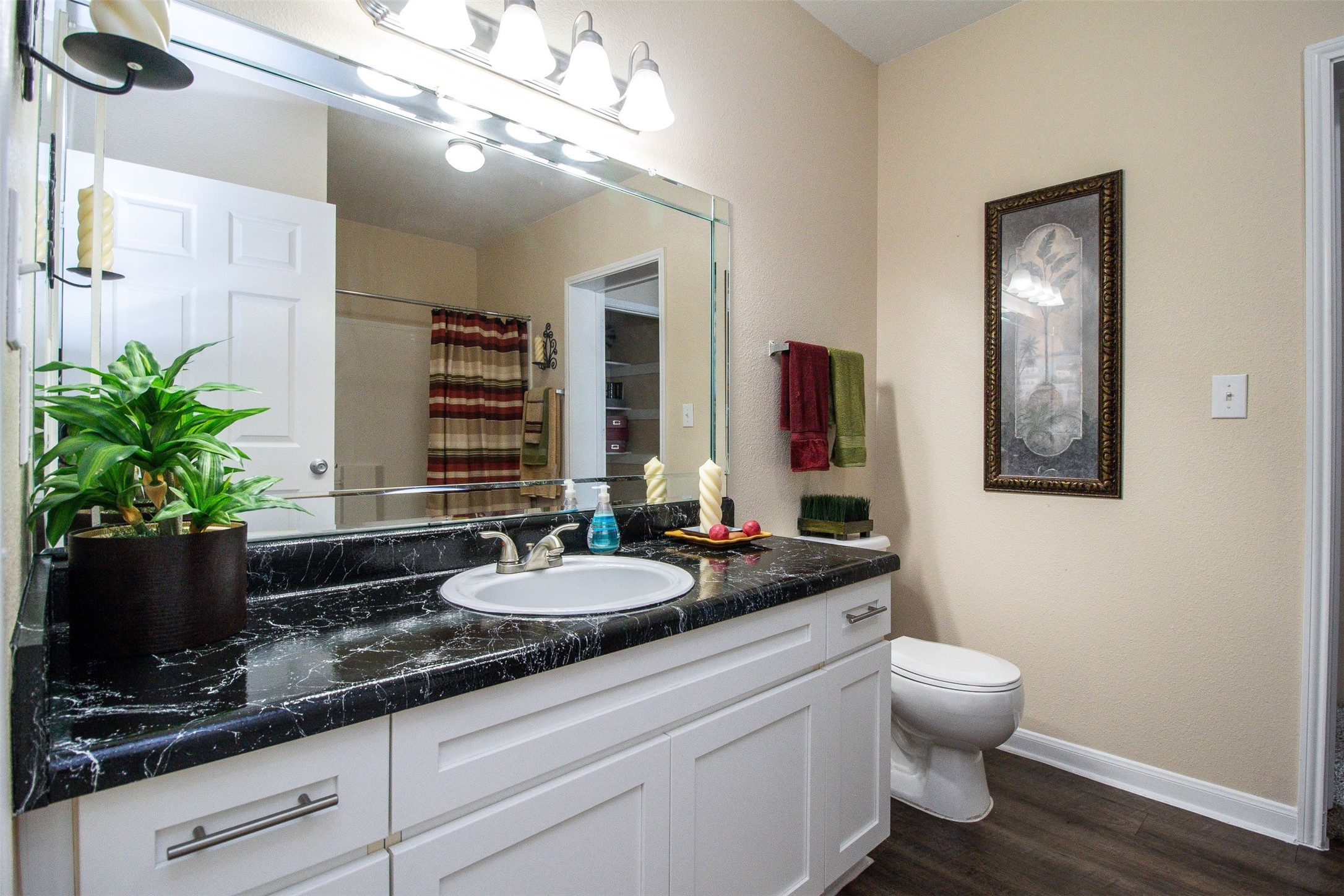 3560 Dixie Drive Houston, TX 77021 - Photo 5 of 11 a bathroom with a granite countertop sink and a mirror