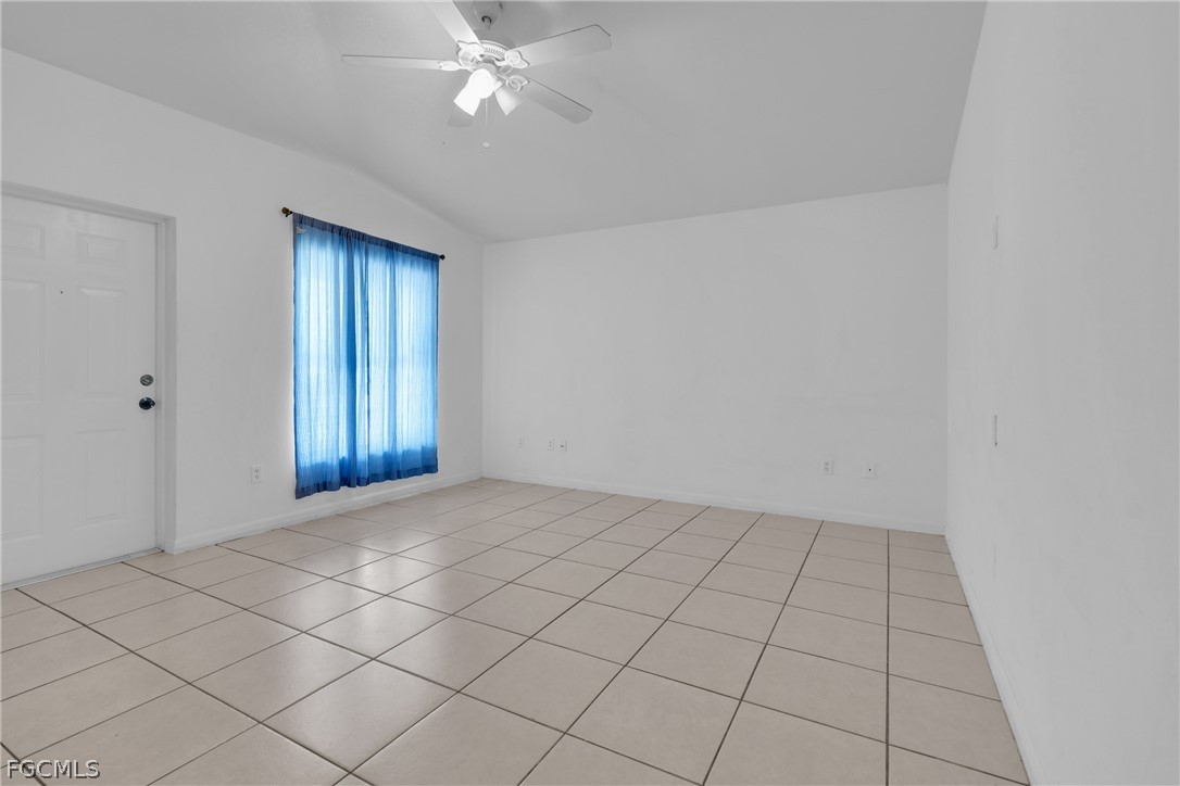 4716-4718 21st Street Southwest Lehigh Acres, FL 33973 - Photo 11 of 21 a view of an empty room and window
