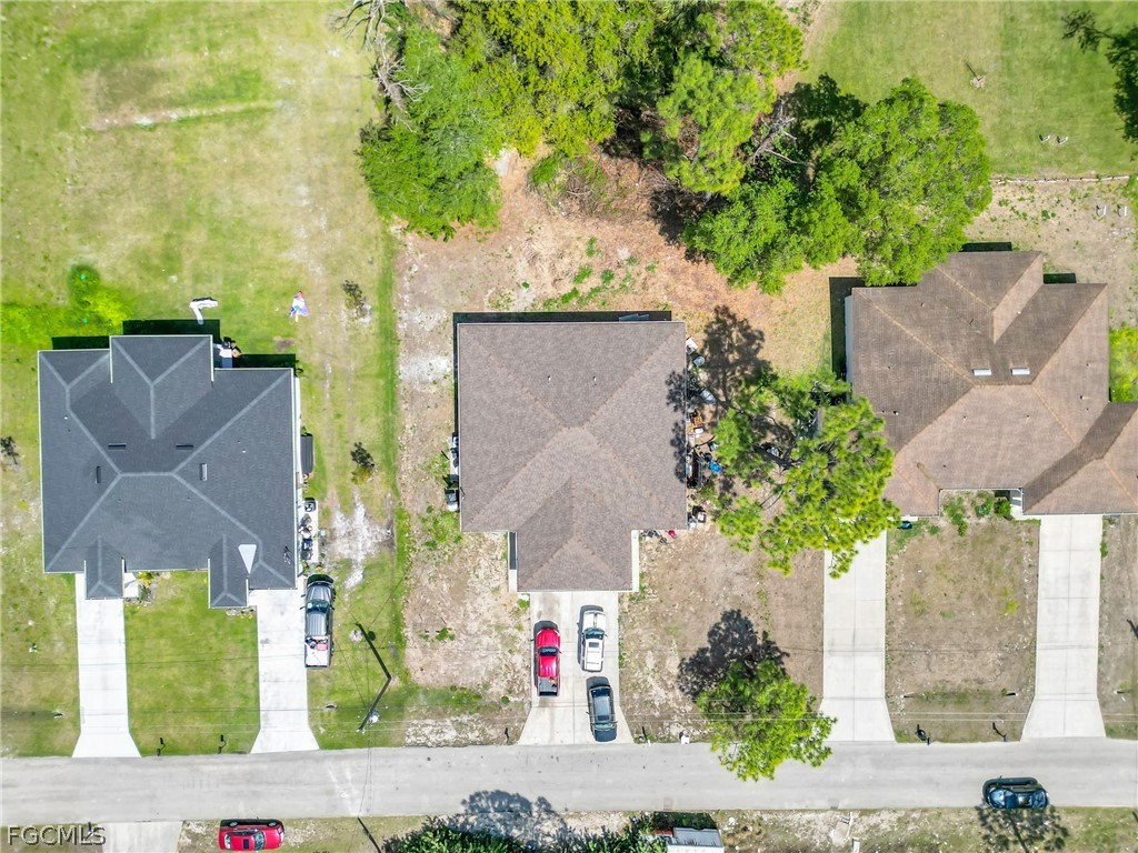 4716-4718 21st Street Southwest Lehigh Acres, FL 33973 - Photo 20 of 21 front view of a house