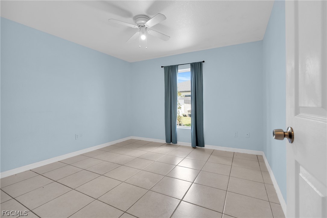 4716-4718 21st Street Southwest Lehigh Acres, FL 33973 - Photo 8 of 21 a view of a livingroom with a window