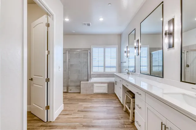 swimming pool view with a seating space