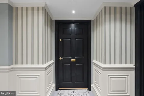 a view of entryway with a front door