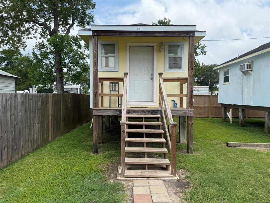 613 24th Street, Unit A Dickinson, TX 77539 - Photo 8 of 15 a view of a house with a yard