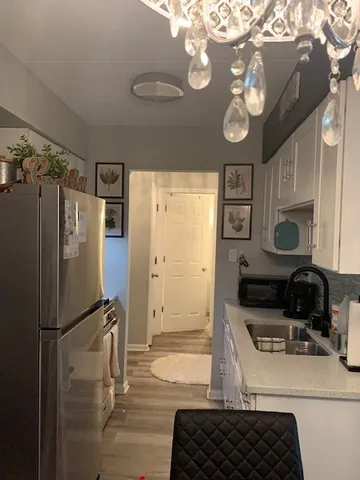 a bedroom with bed and window