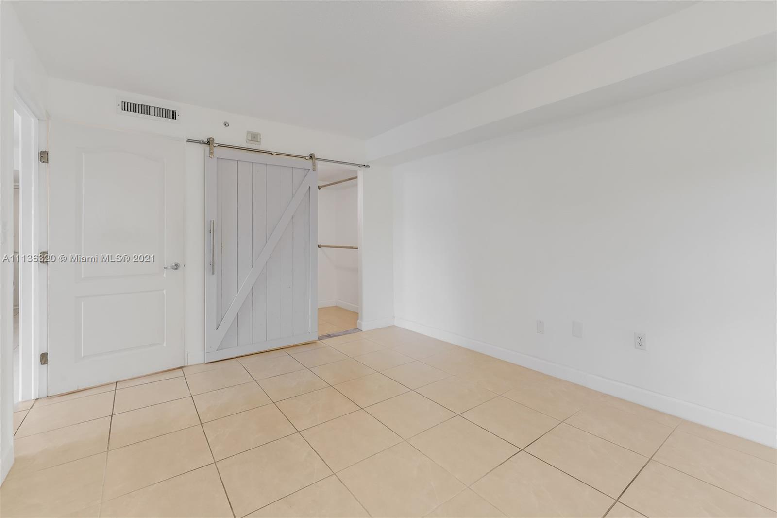 280 Southwest 20th Road, Unit 404 Miami, FL 33129 - Photo 18 of 52 a view of an empty room