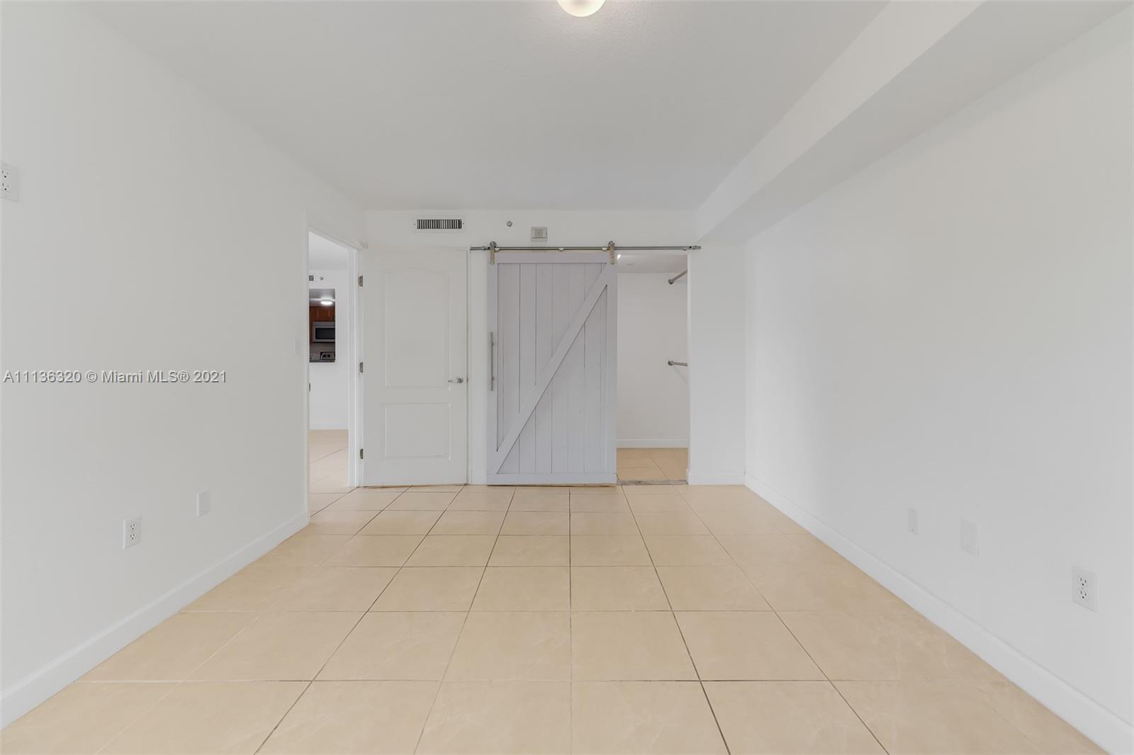 280 Southwest 20th Road, Unit 404 Miami, FL 33129 - Photo 20 of 52 a view of an empty room