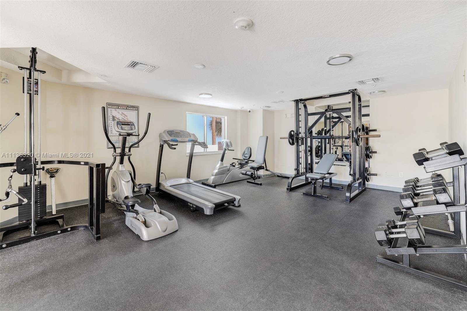 280 Southwest 20th Road, Unit 404 Miami, FL 33129 - Photo 28 of 52 a view of a room with gym equipment