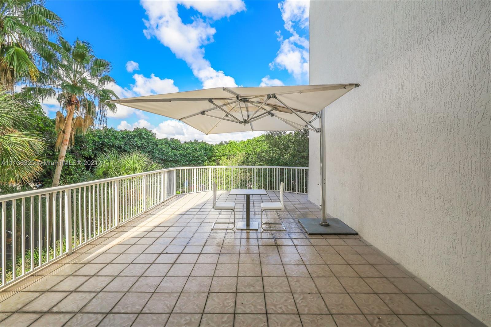 280 Southwest 20th Road, Unit 404 Miami, FL 33129 - Photo 36 of 52 a view of a roof deck