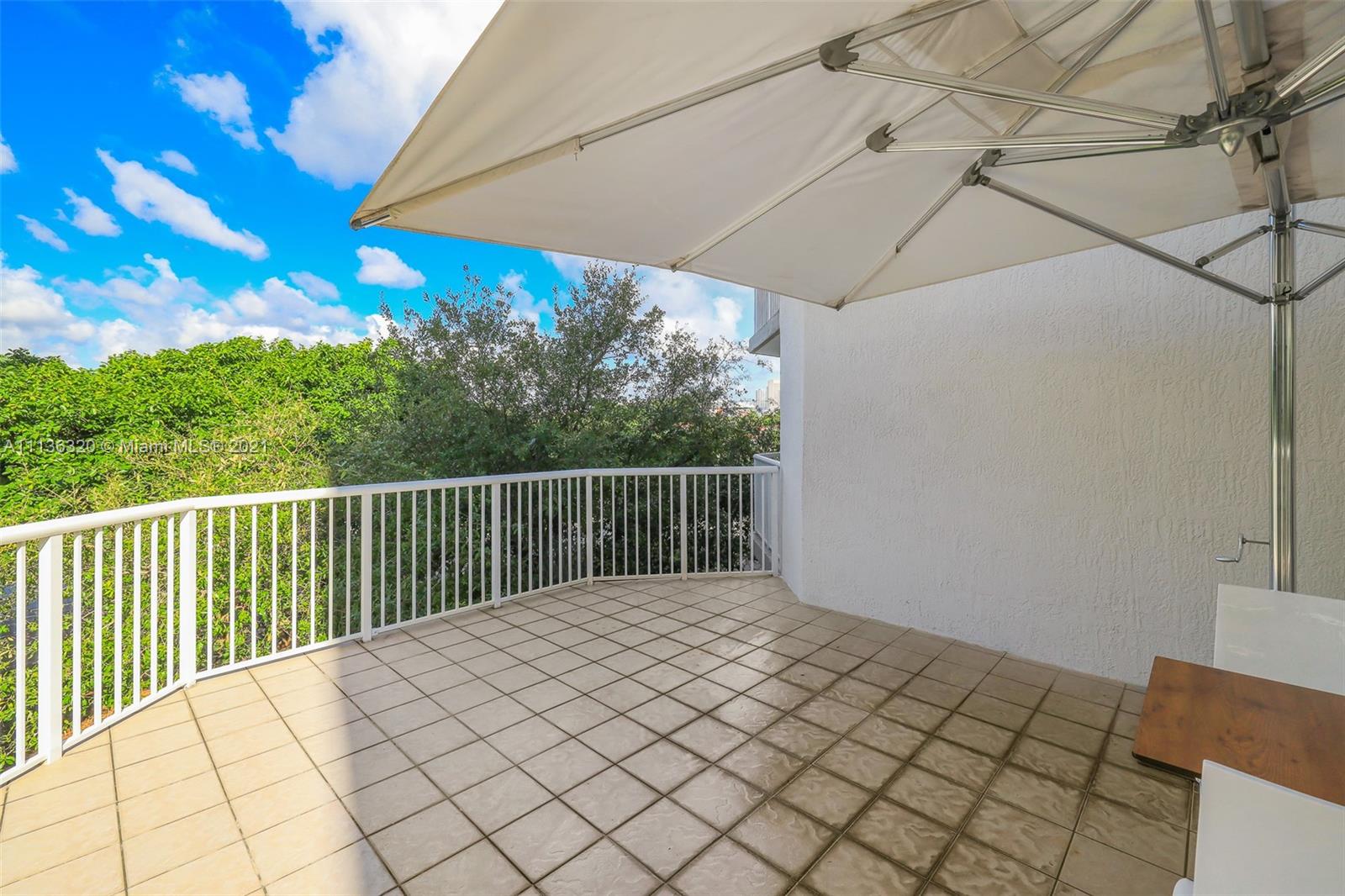 280 Southwest 20th Road, Unit 404 Miami, FL 33129 - Photo 38 of 52 a view of a roof deck