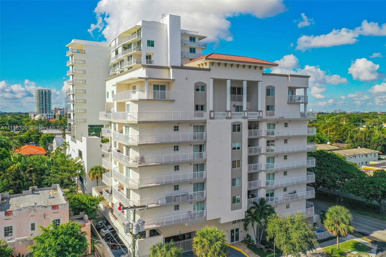 280 Southwest 20th Road, Unit 404 Miami, FL 33129 - Photo 45 of 52 a front view of a multi story building with yard