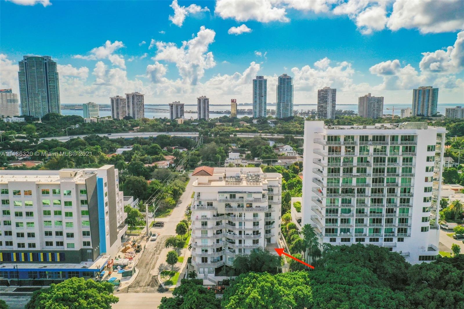 280 Southwest 20th Road, Unit 404 Miami, FL 33129 - Photo 46 of 52 a view of a city with tall buildings