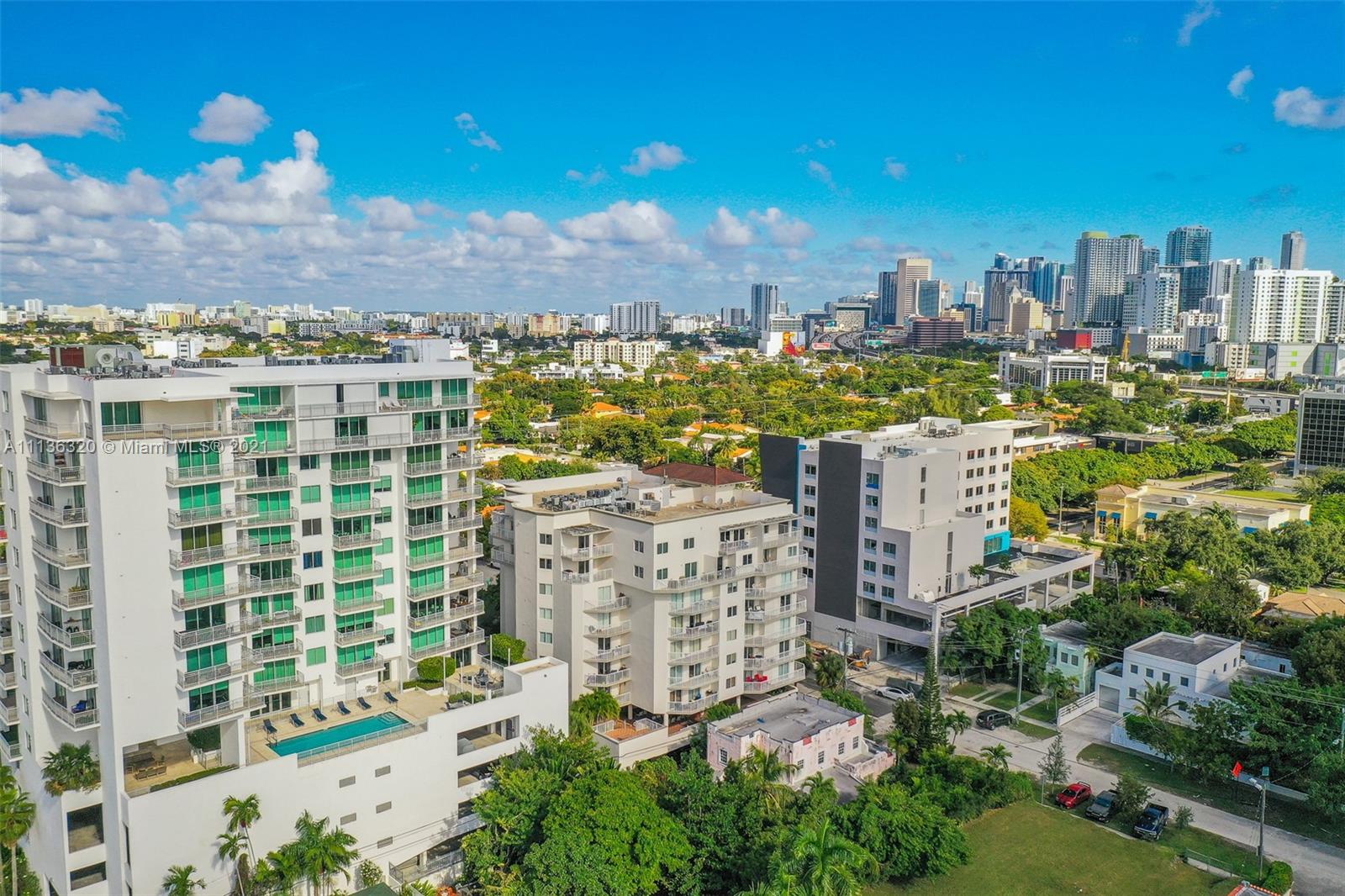 280 Southwest 20th Road, Unit 404 Miami, FL 33129 - Photo 48 of 52 a view of a city with tall buildings
