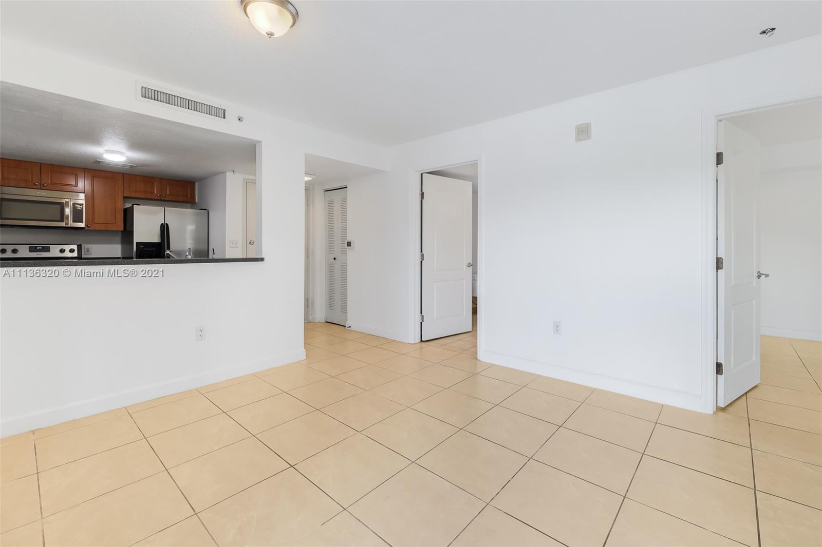 280 Southwest 20th Road, Unit 404 Miami, FL 33129 - Photo 6 of 52 a view of a kitchen with a sink