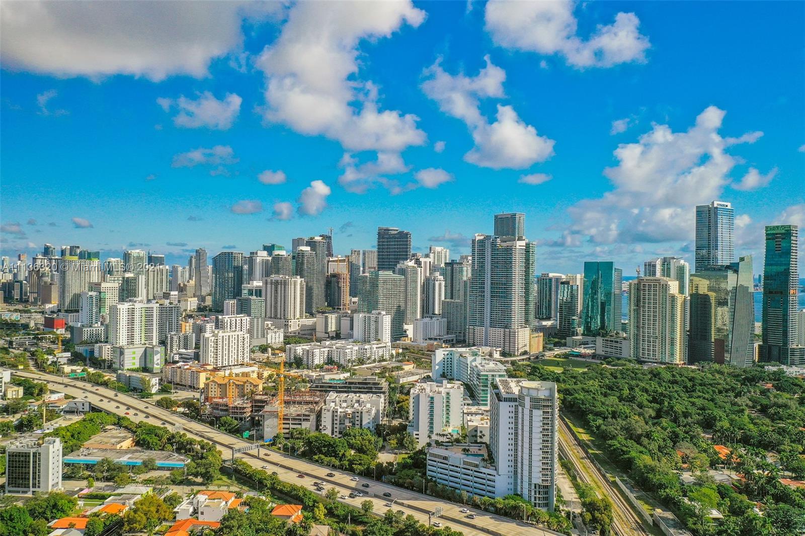 280 Southwest 20th Road, Unit 404 Miami, FL 33129 - Photo 51 of 52 a view of a city with tall buildings