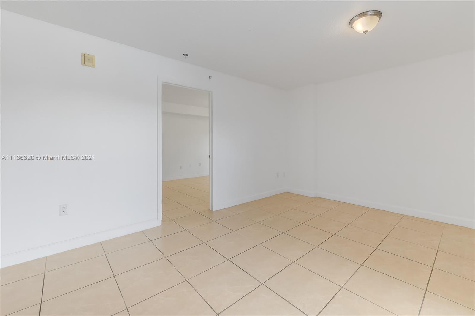 280 Southwest 20th Road, Unit 404 Miami, FL 33129 - Photo 9 of 52 a view of an empty room