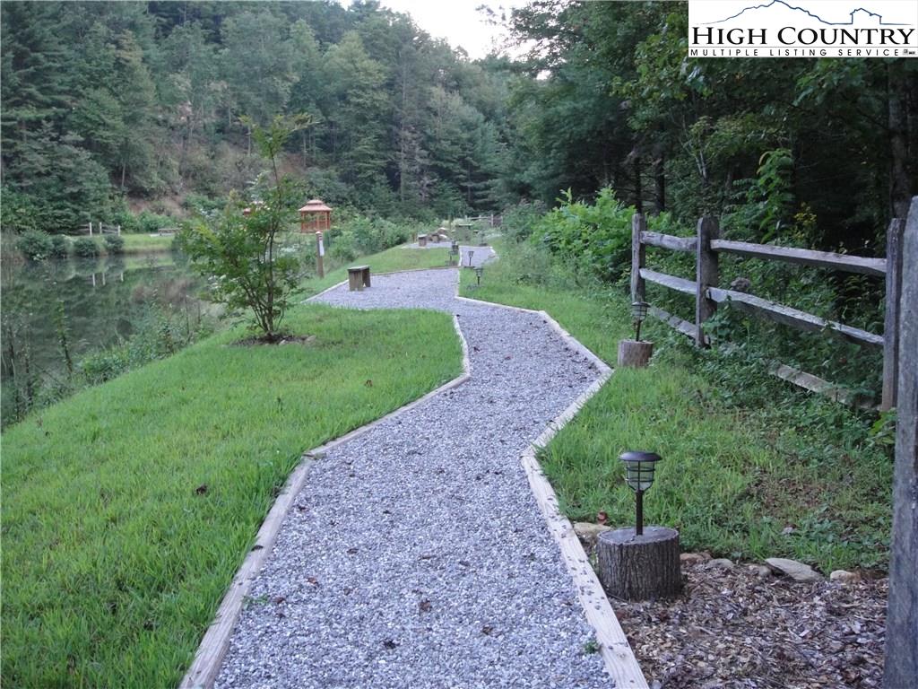 72-73 Buck Mountain Road Purlear, NC 28665 - Photo 33 of 47 a view of a back yard