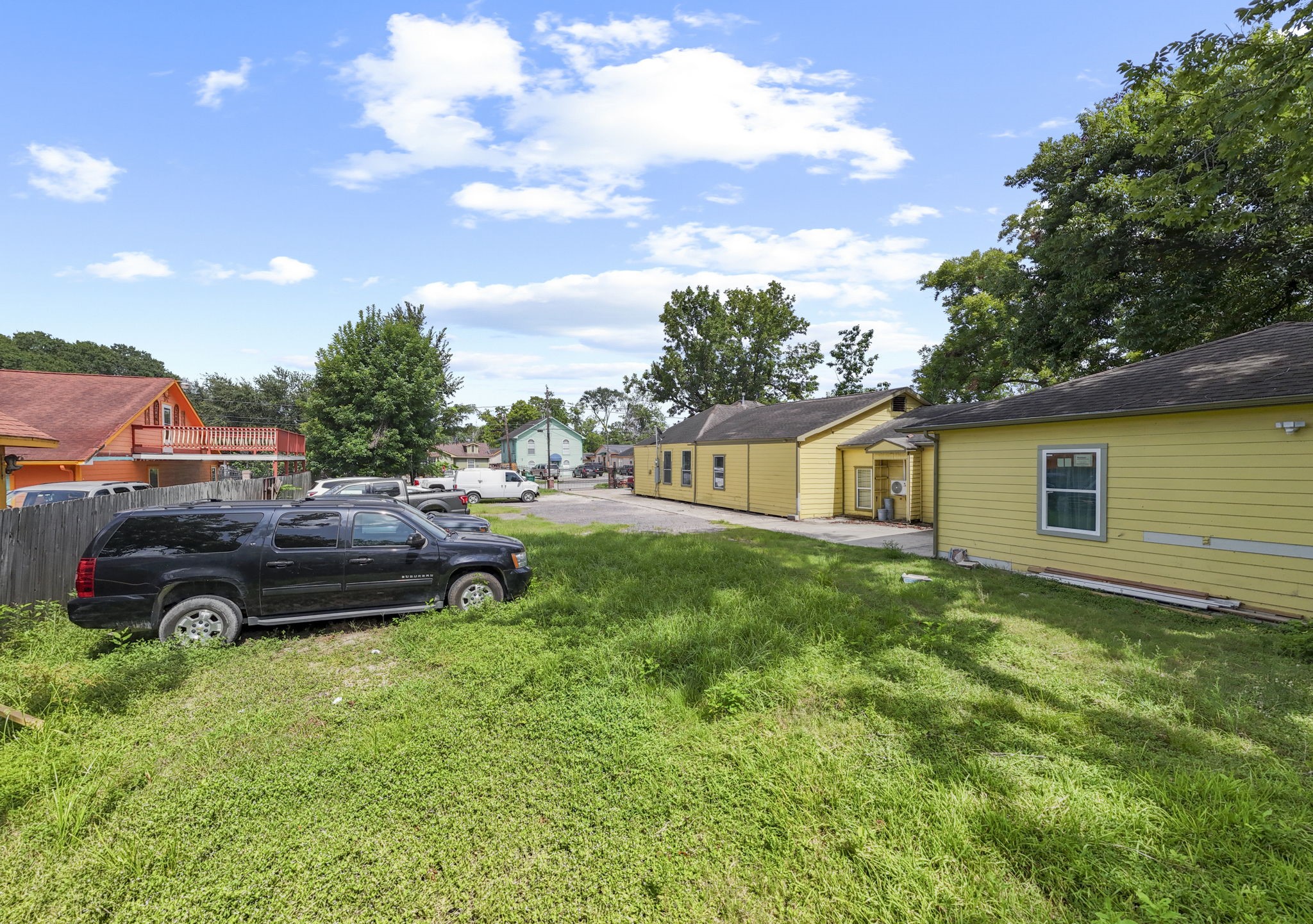 a view of a house with a back yard