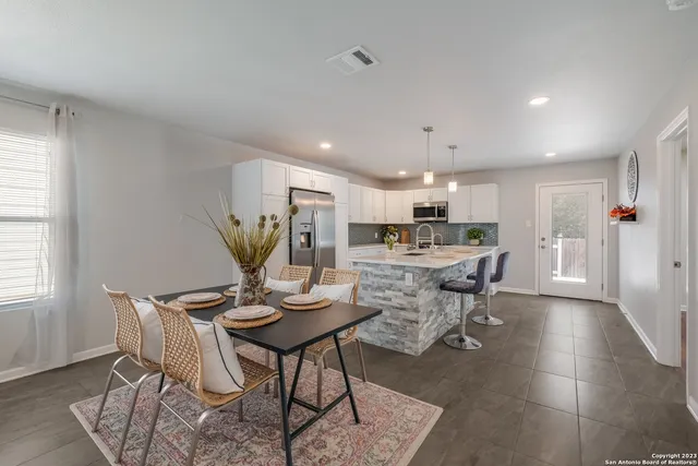 a view of a dining room with furniture