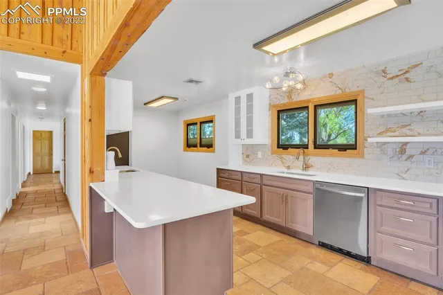a view of a livingroom with furniture and windows