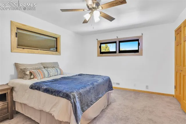 a bathroom with a sink vanity and a mirror