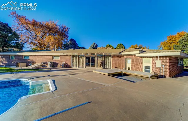 a kitchen with stainless steel appliances a stove sink and cabinets