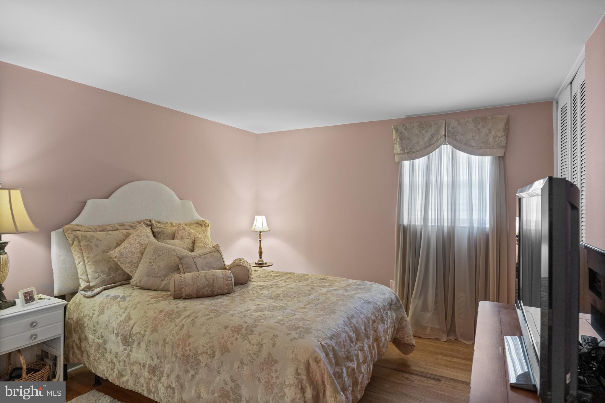 122 Hamilton Road Marlton, NJ 08053 - Photo 13 of 25 a bedroom with a bed and a mirror