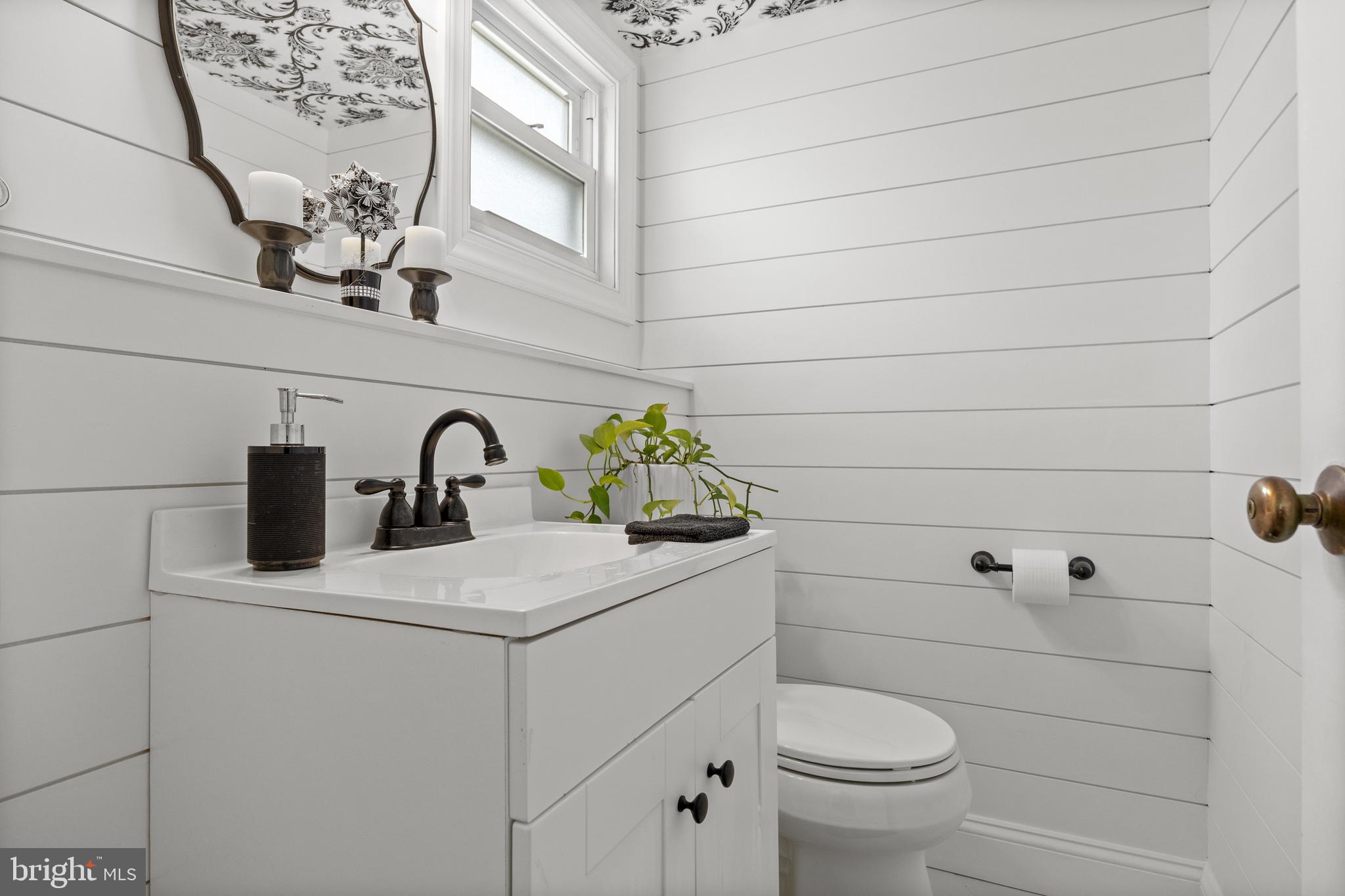 122 Hamilton Road Marlton, NJ 08053 - Photo 22 of 25 a bathroom with a sink a toilet and vanity