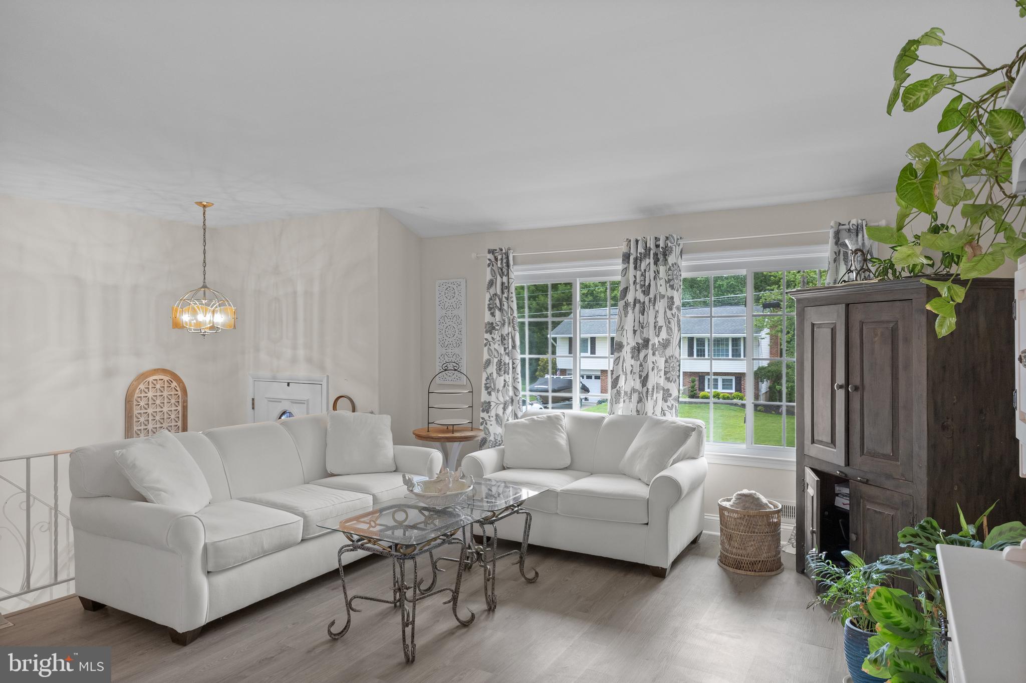 122 Hamilton Road Marlton, NJ 08053 - Photo 6 of 25 a living room with furniture and a potted plant
