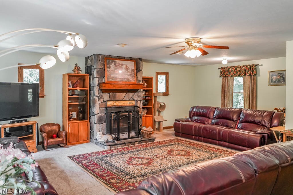 842 Dunning Road Canal Fulton, OH 44614 - Photo 3 of 35 The great room features a lovely fireplace and tons of room to gather.